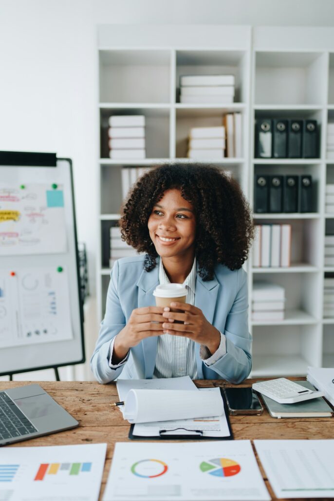 American African business woman using document,
